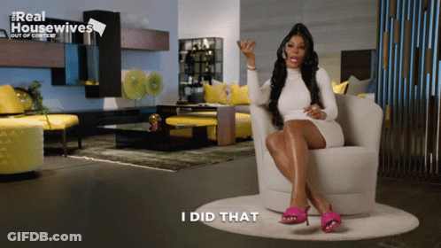 Woman In White Dress Sitting With I Did That GIF