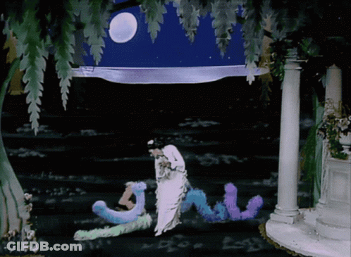 Woman In White Dress Standing Before NV Sign GIF