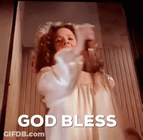 Woman In White Dress Standing By God Bless Door GIF
