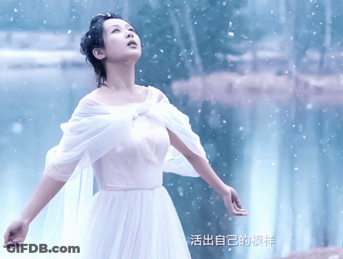 Woman In White Dress Standing By Lake GIF