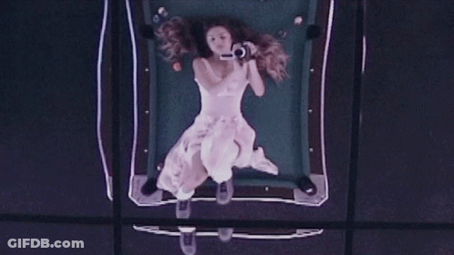 Woman In White Dress Taking Selfie GIF