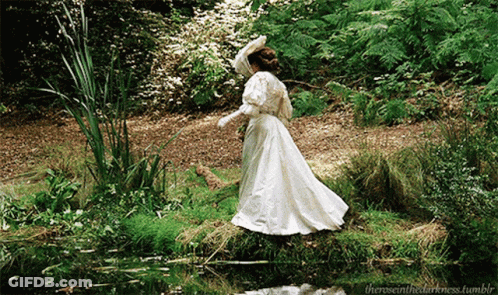Woman In White Dress Walking On Water GIF