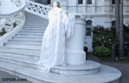 Woman In White Dress With Angel Wings GIF