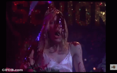 Woman In White Dress With Blood On Face GIF