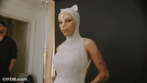 Woman In White Dress With Cat Headpiece GIF