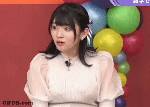 Woman In White Dress With Colorful Balloons GIF