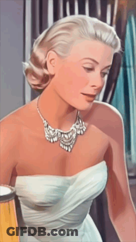 Woman In White Dress With Diamond Necklace GIF