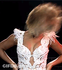 Woman In White Dress With Feathers GIF