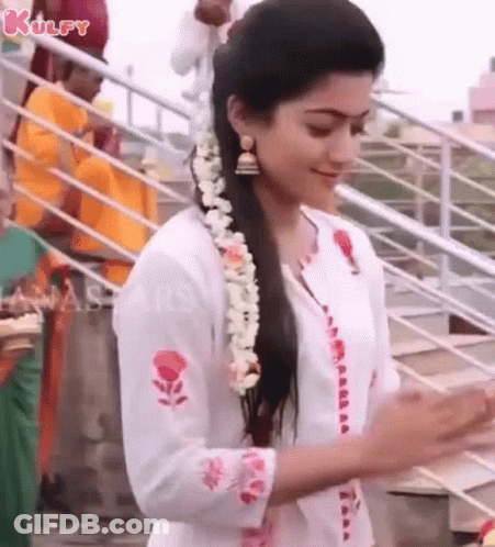 Woman In White Dress With Flower Garland GIF
