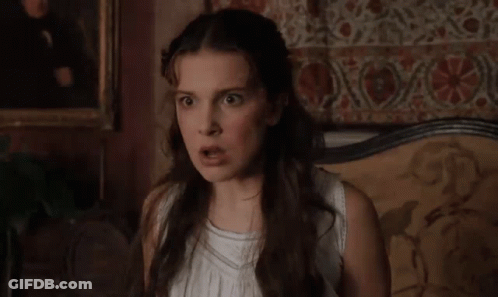Woman In White Dress With Funny Face GIF