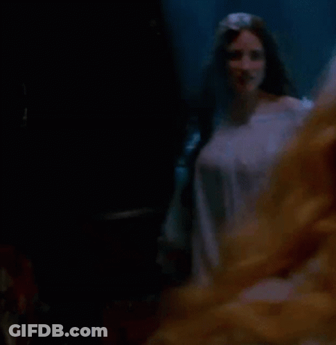 Woman In White Dress With Long Sleeves Dancing GIF