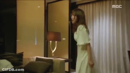 Woman In White Dress With MBC Logo GIF