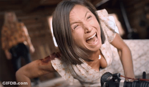 Woman In White Floral Shirt Screaming GIF