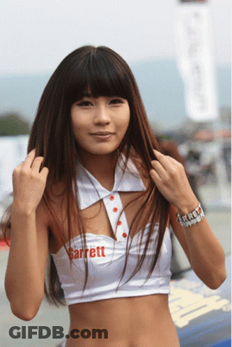Woman In White Garrett Top Holding Hair GIF