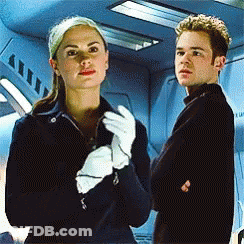 Woman In White Gloves Next To Man GIF