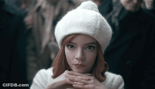 Woman In White Hat And White Coat GIF