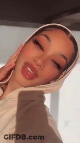 Woman In White Hoodie Taking Selfie GIF