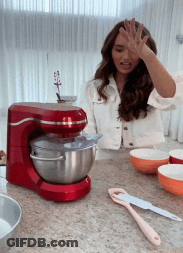 Woman In White Jacket With Red Stand Mixer GIF