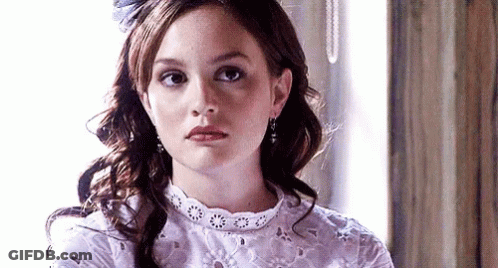 Woman In White Lace Dress And Earrings GIF