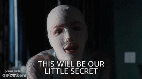Woman In White Mask Says Little Secret GIF