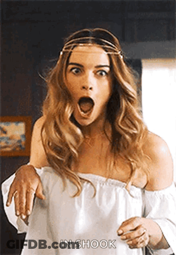 Woman In White Off Shoulder Top Shocked GIF