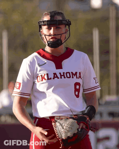 Woman In White Oklahoma Jersey Holding Glove GIF