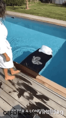 Woman In White Robe By Pool GIF