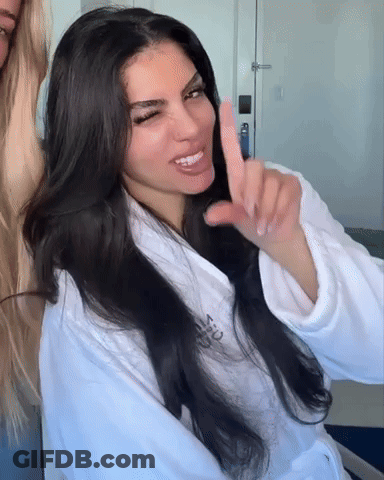 Woman In White Robe Saying Victoria GIF
