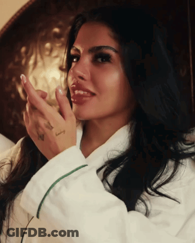 Woman In White Robe With I Love You Tattoo GIF