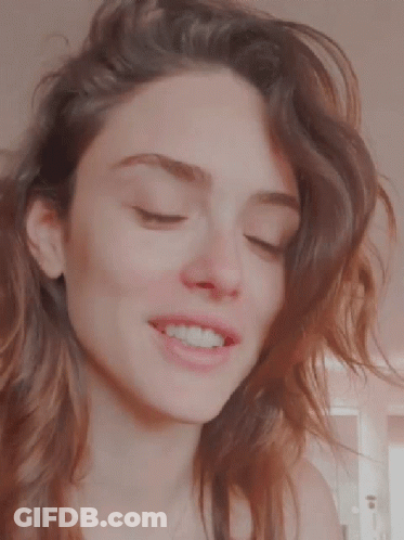 Woman In White Robe With Red Lipstick GIF