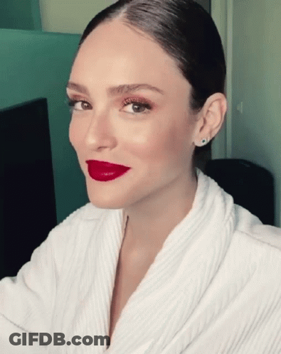 Woman In White Robe With Red Lipstick GIF