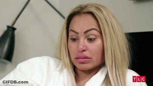 Woman In White Robe With TLC GIF