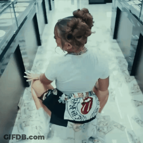 Woman In White Shirt And Black Shorts With Rolling Stones Logo GIF