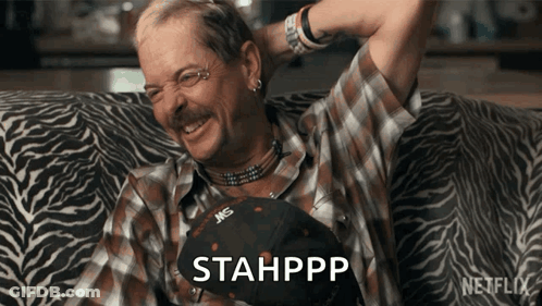 Woman In White Shirt And Black Vest GIF