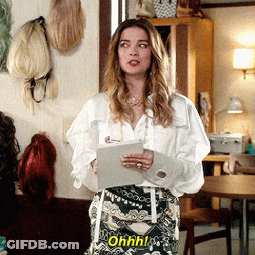 Woman In White Shirt And Green Skirt Says Ohhh GIF