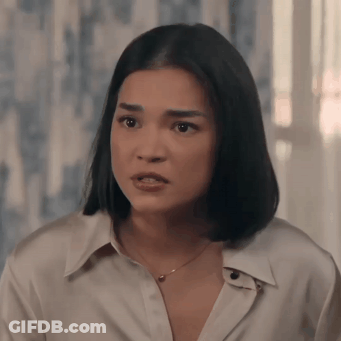 Woman In White Shirt And Necklace GIF