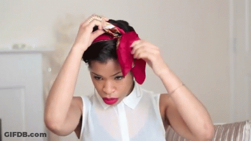 Woman In White Shirt And Red Head Scarf GIF