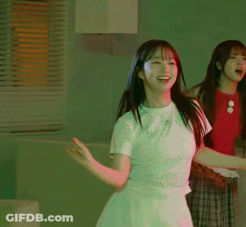 Woman In White Shirt Dancing With Another Woman GIF