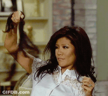 Woman In White Shirt Holding Hair GIF