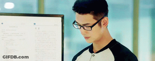 Woman In White Shirt Holding Sign GIF