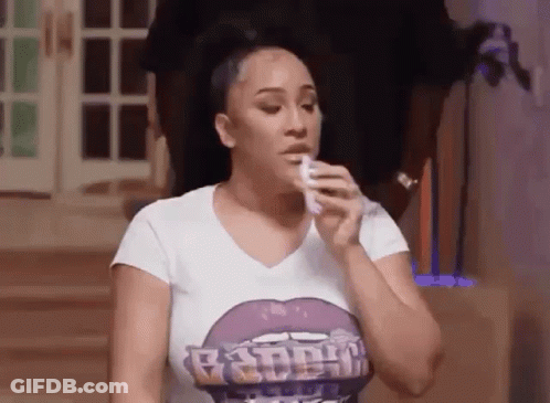 Woman In White Shirt Holding Tissue To Face GIF