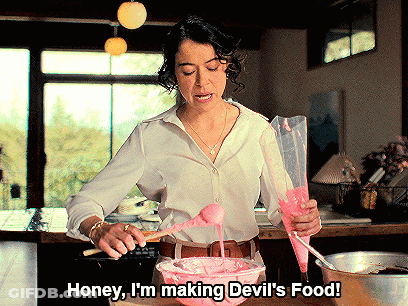 Woman In White Shirt Making Devil's Food GIF