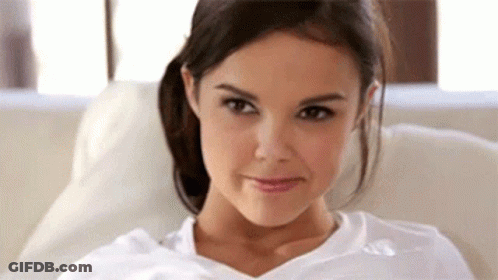 Woman In White Shirt Making Funny Face GIF