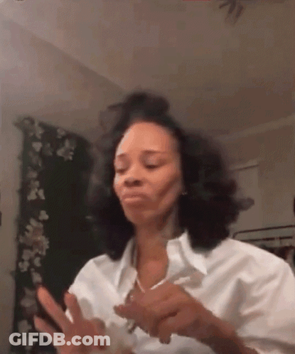 Woman In White Shirt Making Funny Face With Cell Phone GIF