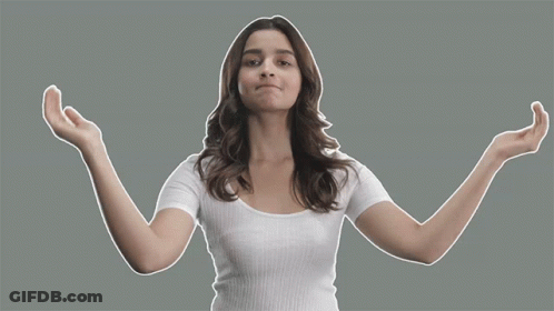 Woman In White Shirt Making Hand Gesture GIF