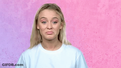 Woman In White Shirt Making Sad Face GIF