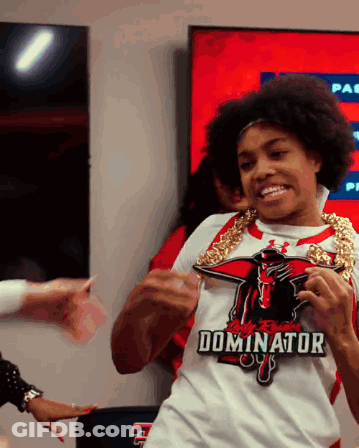 Woman In White Shirt Saying Dominator GIF