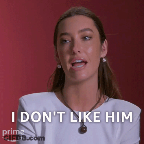 Woman In White Shirt Saying I Don't Like Him GIF