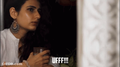 Woman In White Shirt Saying Ufff GIF