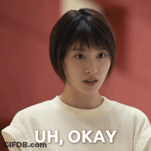 Woman In White Shirt Saying Uh Okay GIF